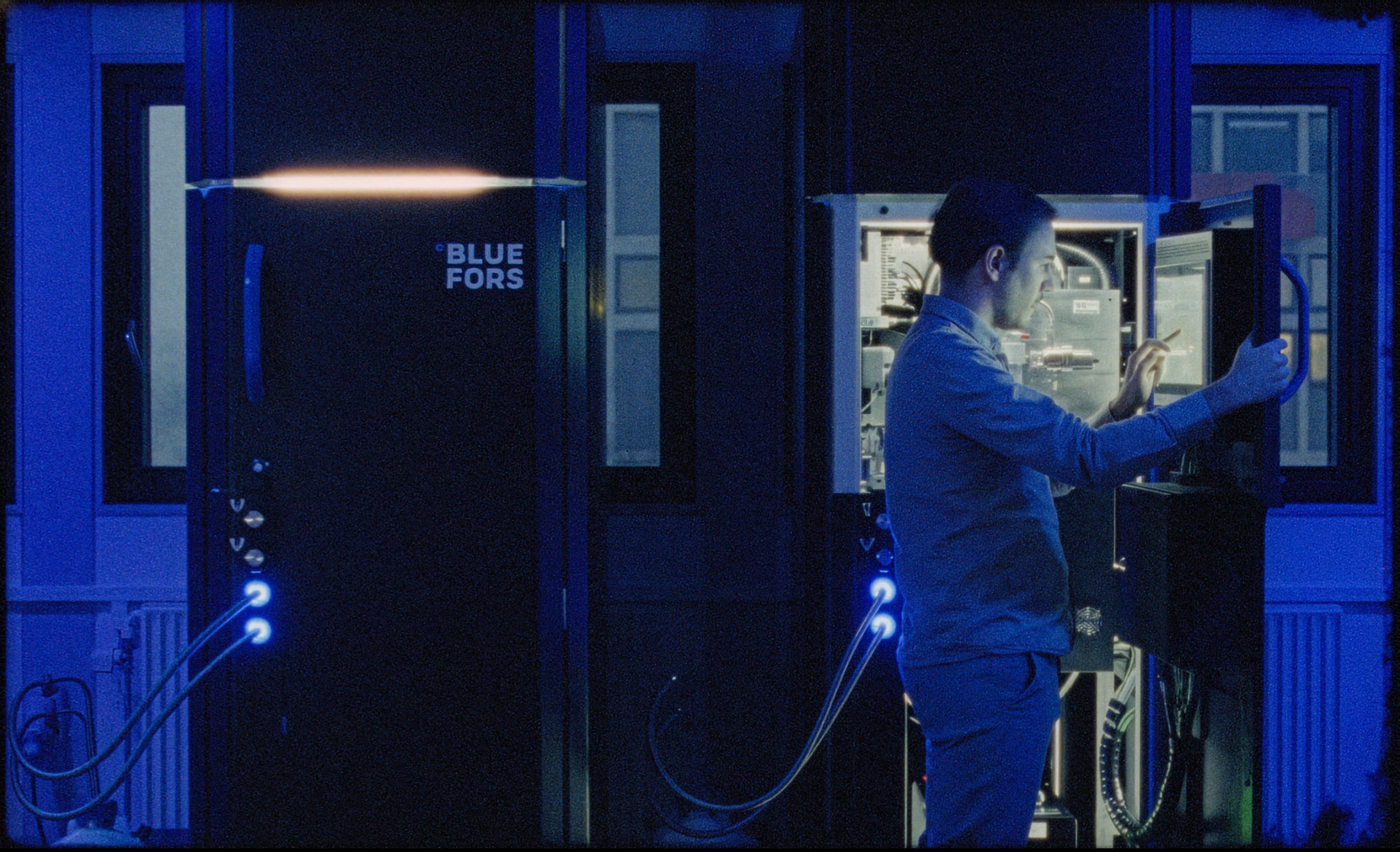 A researcher working with a quantum experiment in the laboratory
